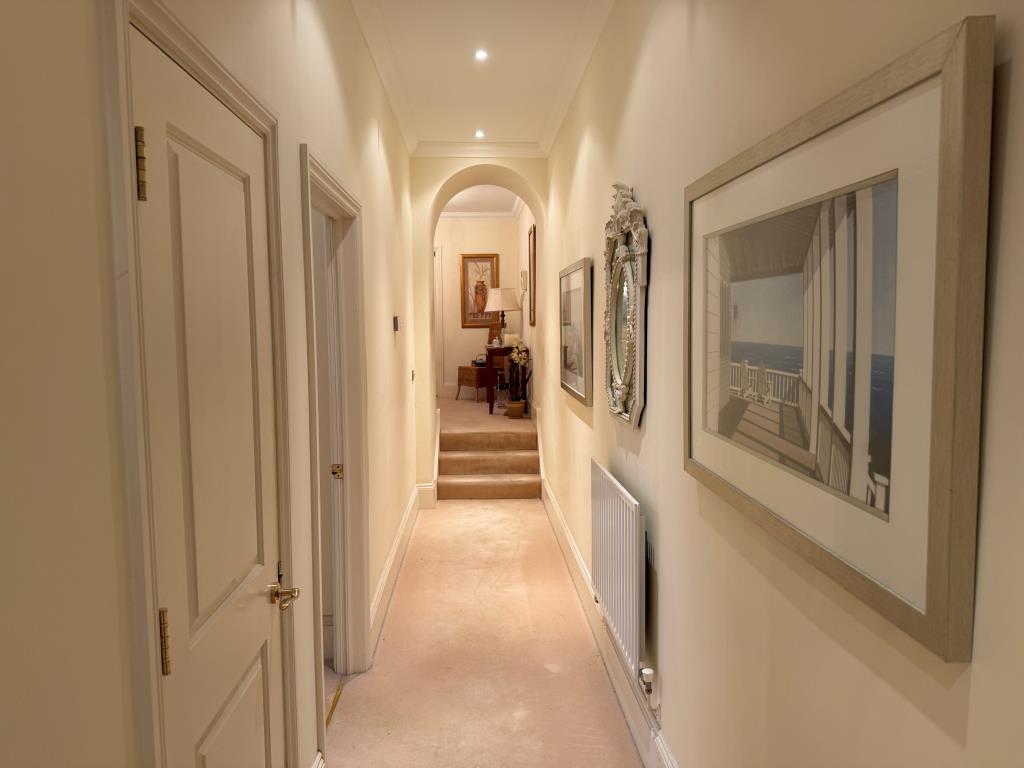 Lot: 127 - GROUND FLOOR FLAT WITH GARDENS AND PARKING IN FAVOURED MEADS LOCATION - Hallway with stairs to dining area